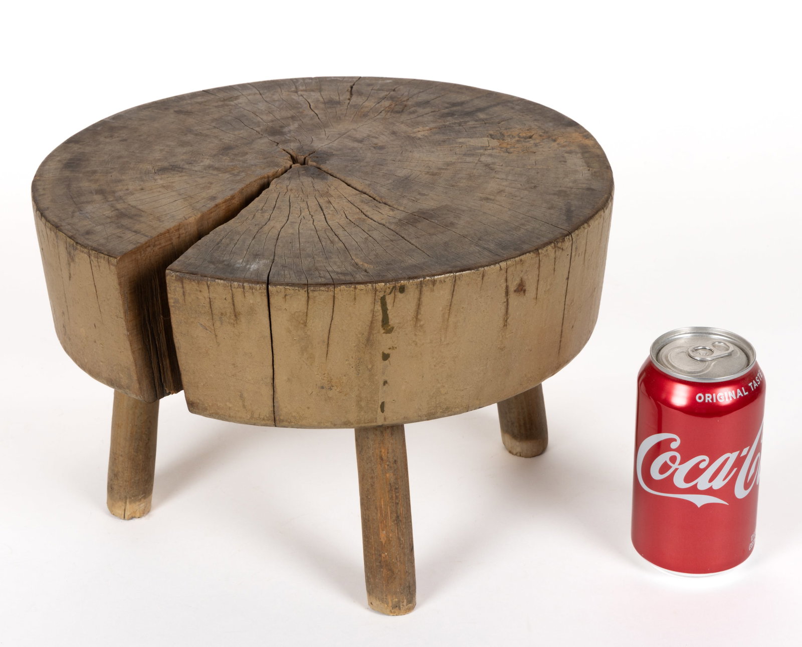 AMERICAN VERNACULAR PAINTED SLAB STOOL: AMERICAN VERNACULAR PAINTED SLAB STOOL, the thick slab top is supported by four round legs. Retains an early, probably original painted surface with the top having a scrubbed natural surface. Second h