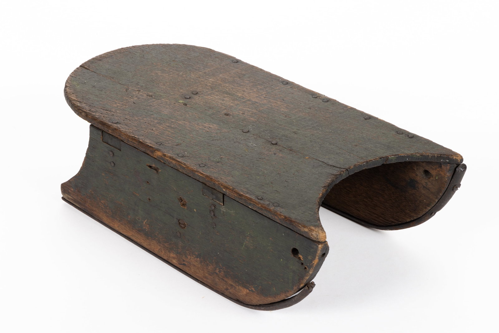 AMERICAN OR ENGLISH OAK MINIATURE / DOLL'S SLED: AMERICAN OR ENGLISH OAK MINIATURE / DOLL'S SLED, of typical form with a shaped top and applied shaped runners with iron edges. Retains the likely original lightly-finished surface. Late