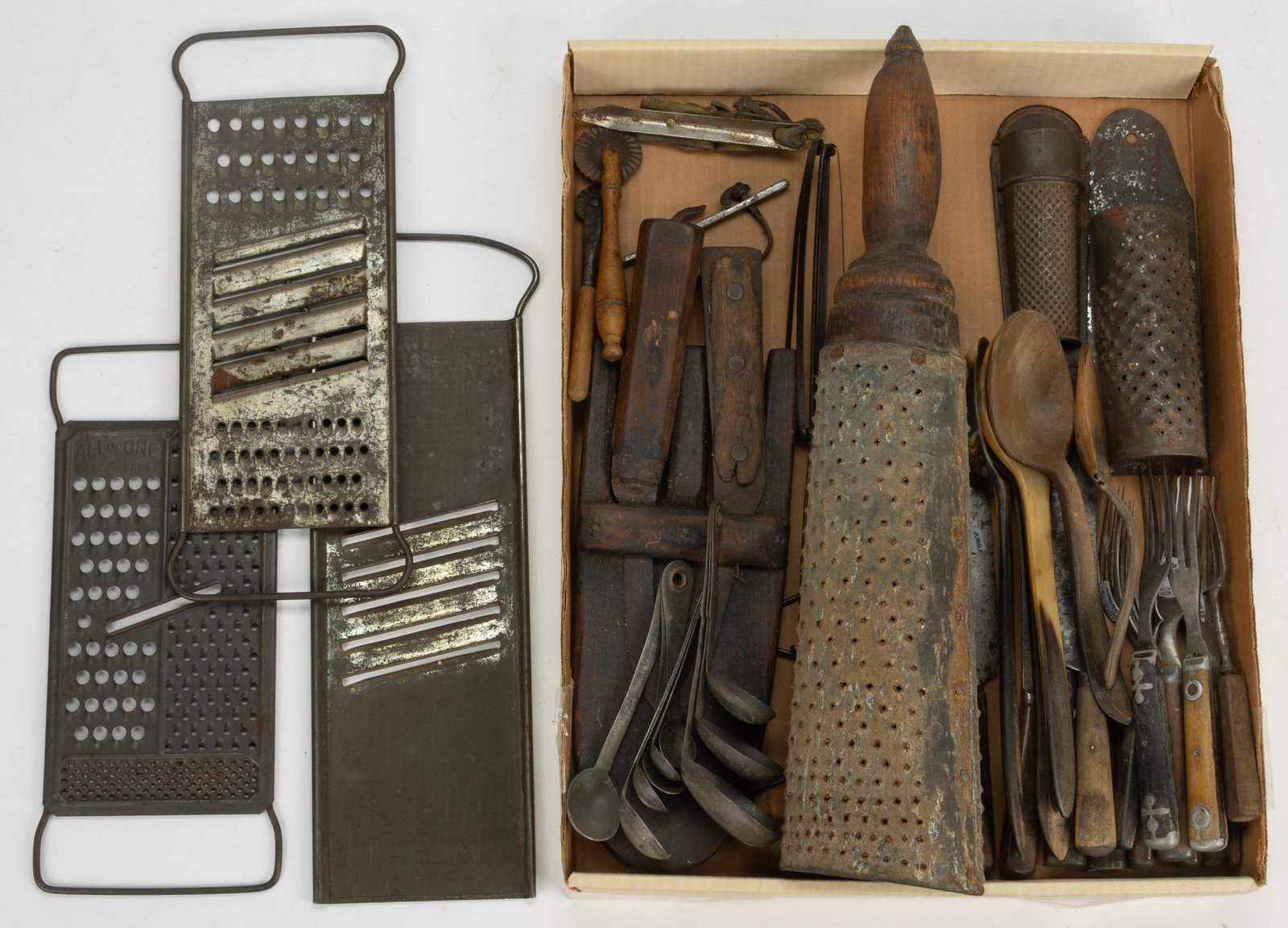 ASSORTED SHEET-IRON AND OTHER KITCHEN AND DOMESTIC ARTICLES, UNCOUNTED LOT: ASSORTED SHEET-IRON AND OTHER KITCHEN AND DOMESTIC ARTICLES, UNCOUNTED LOT, comprising of six graters, including three flat examples, a nutmeg example and a circular-form tapered example with a wooden