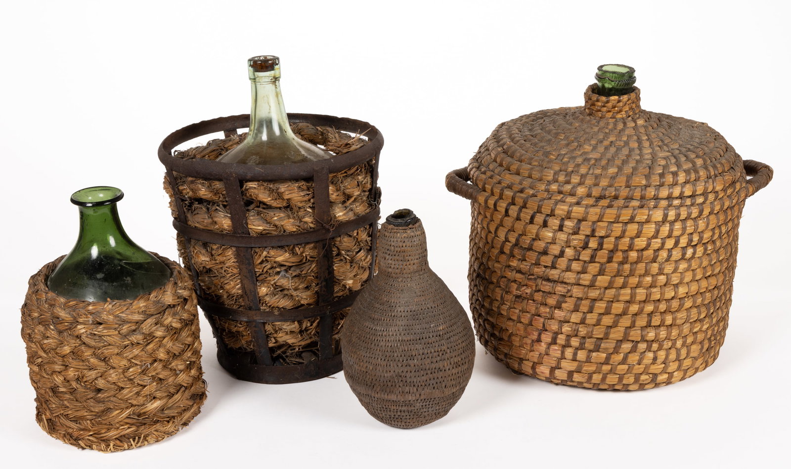 ANTIQUE BASKET-COVERED UTILITY BOTTLES / DEMI-JOHNS, LOT OF FOUR (1 of 1)
