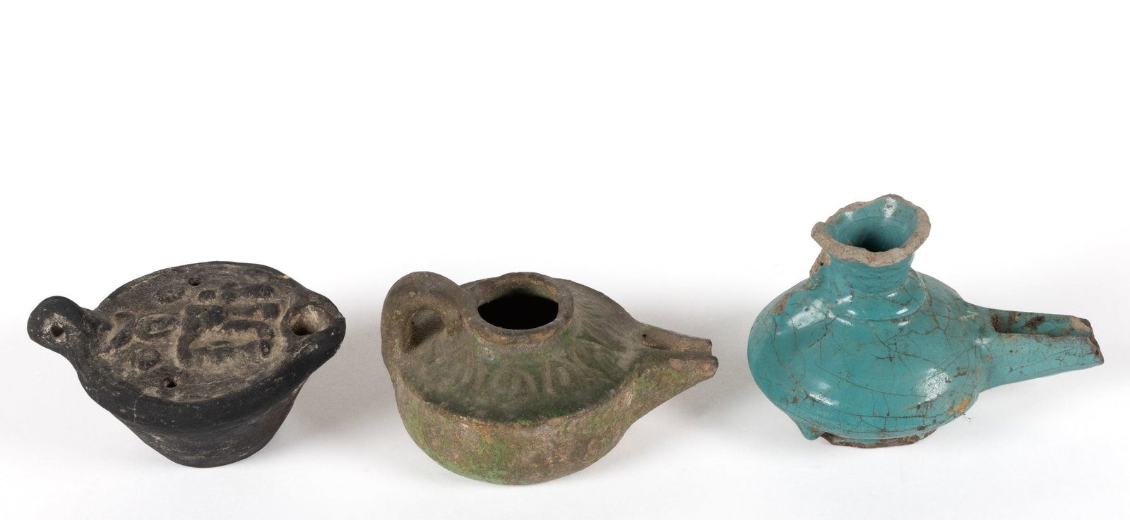 ASSORTED ANCIENT POTTERY / TERRACOTTA OIL LAMPS, LOT OF THREE (1 of 2)