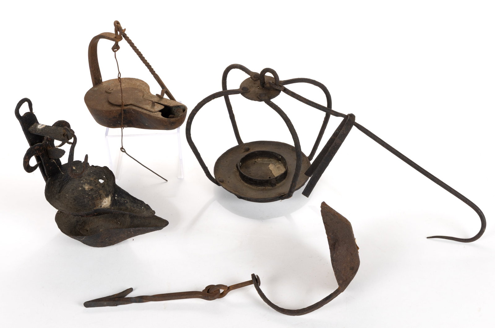 ASSORTED WROUGHT-IRON LIGHTING ARTICLES, LOT OF FOUR: ASSORTED WROUGHT-IRON LIGHTING ARTICLES, LOT OF FOUR, comprising of a large betty lamp with hook and attached chain with wick pick; a double crusie with upper reservoir having ram's head horn orna