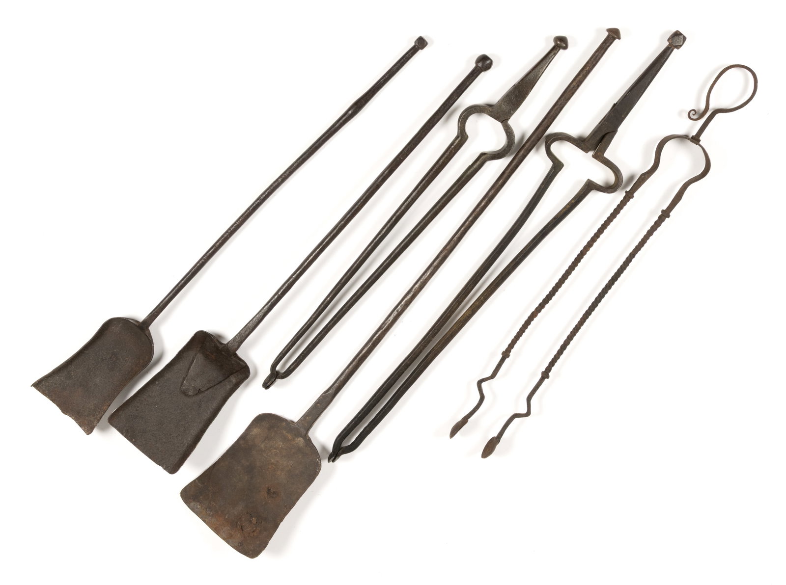 ASSORTED WROUGHT-IRON HEARTH AND FIREPLACE ARTICLES, LOT OF SIX: ASSORTED WROUGHT-IRON HEARTH AND FIREPLACE ARTICLES, LOT OF SIX, comprising of three ember tongs/pipe tongs with disc-form tips, two of scissor-form/hinged examples with a ball and a&nb