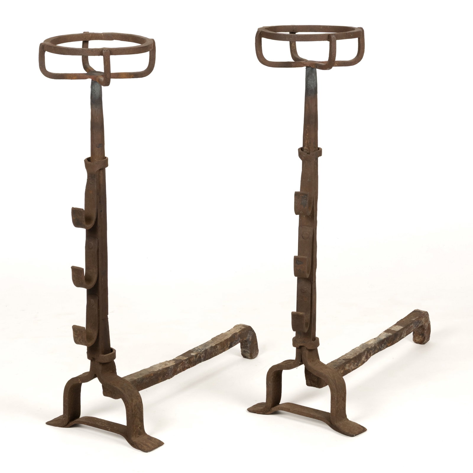 WROUGHT-IRON HEARTH / FIREPLACE CRESSET TOPPED AND SPIT ANDIRONS, PAIR: WROUGHT-IRON HEARTH / FIREPLACE CRESSET TOPPED AND SPIT ANDIRONS, PAIR, each topped plinth topped with a circular-form cresset having four support bars, plinths fitted with a sliding three s