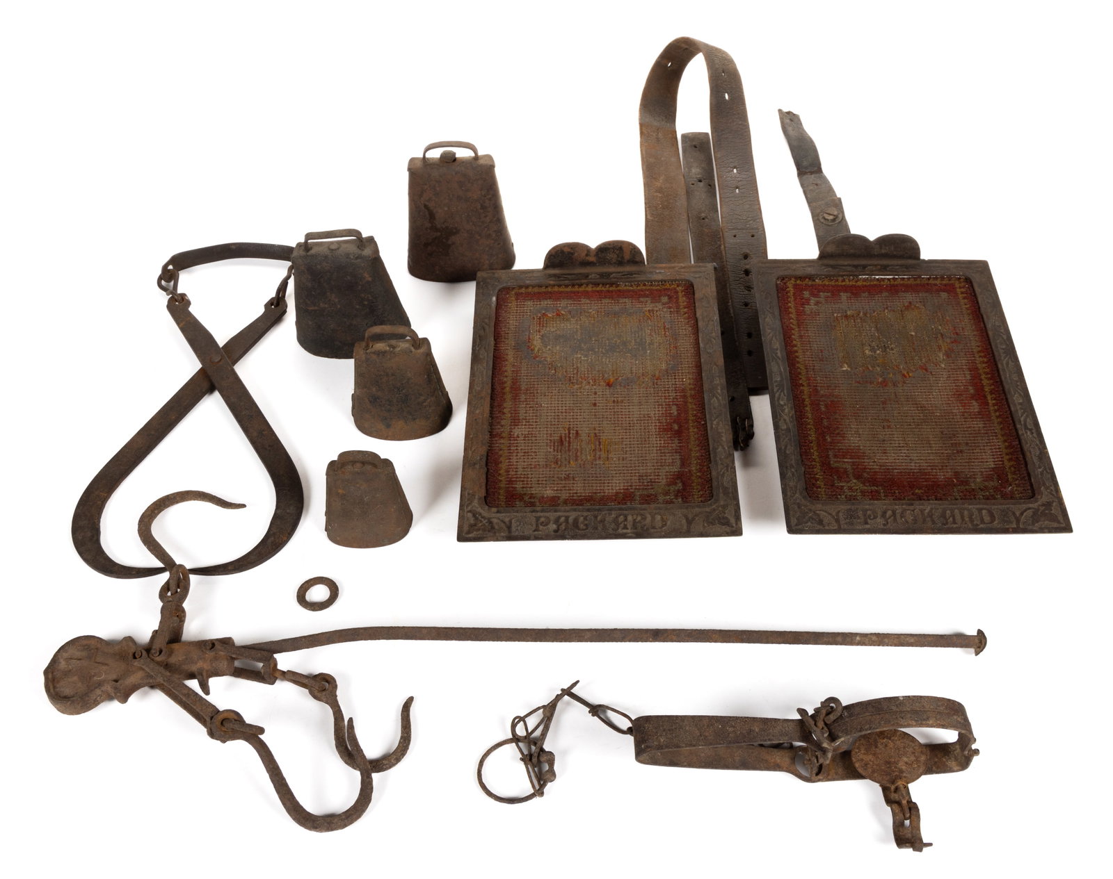 ASSORTED WROUGHT-IRON AND METAL DOMESTIC ARTICLES, LOT OF NINE: ASSORTED WROUGHT-IRON AND METAL DOMESTIC ARTICLES, LOT OF NINE, comprising of four cow/animal bells in various sizes, each having a yoke and three having a clapper; a pair of Packard pump organ f