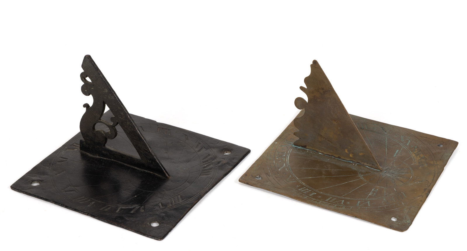 ASSORTED BRASS AND BRONZE SUNDIALS, LOT OF TWO: ASSORTED BRASS AND BRONZE SUNDIALS, LOT OF TWO, each having a roman numeral hour and sections within a circular form, each corner having a mounting hole, having mortice and tenoned construction; compr