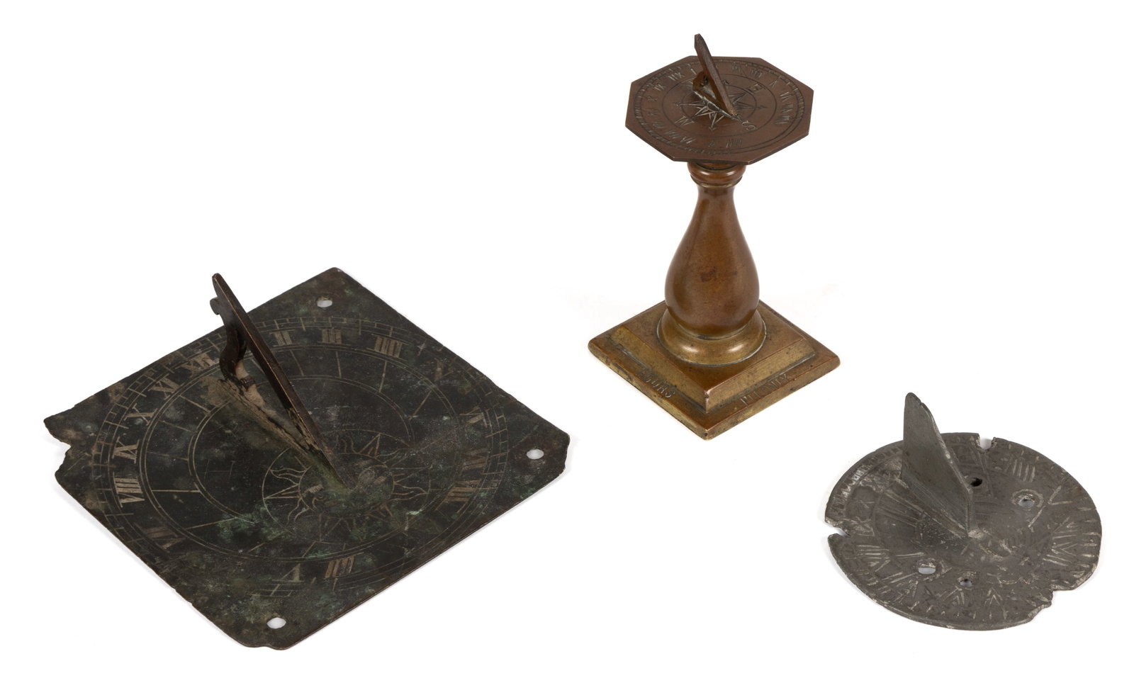 ASSORTED METAL DIMINUTIVE SUNDIALS, LOT OF THREE: ASSORTED METAL DIMINUTIVE SUNDIALS, LOT OF THREE, each having a roman numeral hour and sections within a circular form; comprising of a square-form bronze example, having mortice and tenoned construct