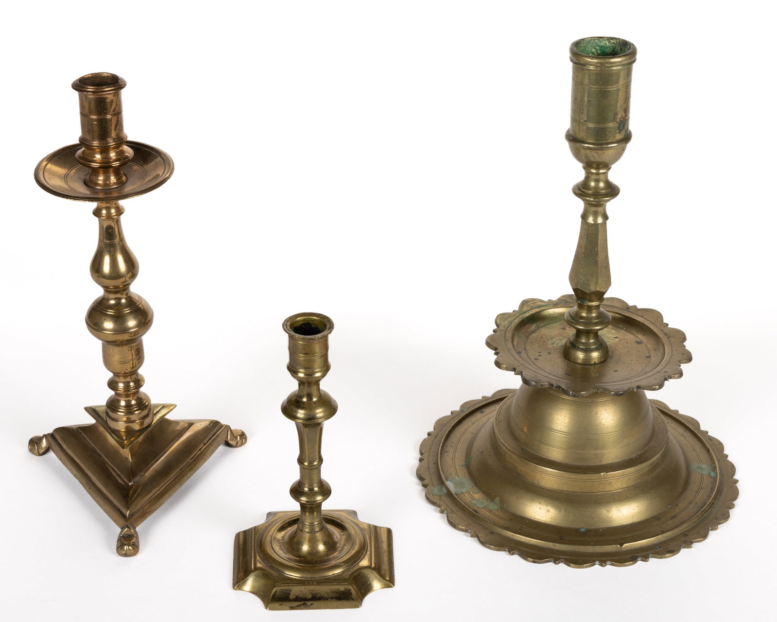 ASSORTED CONTINENTAL BRASS CANDLESTICKS, LOT OF THREE (1 of 2)