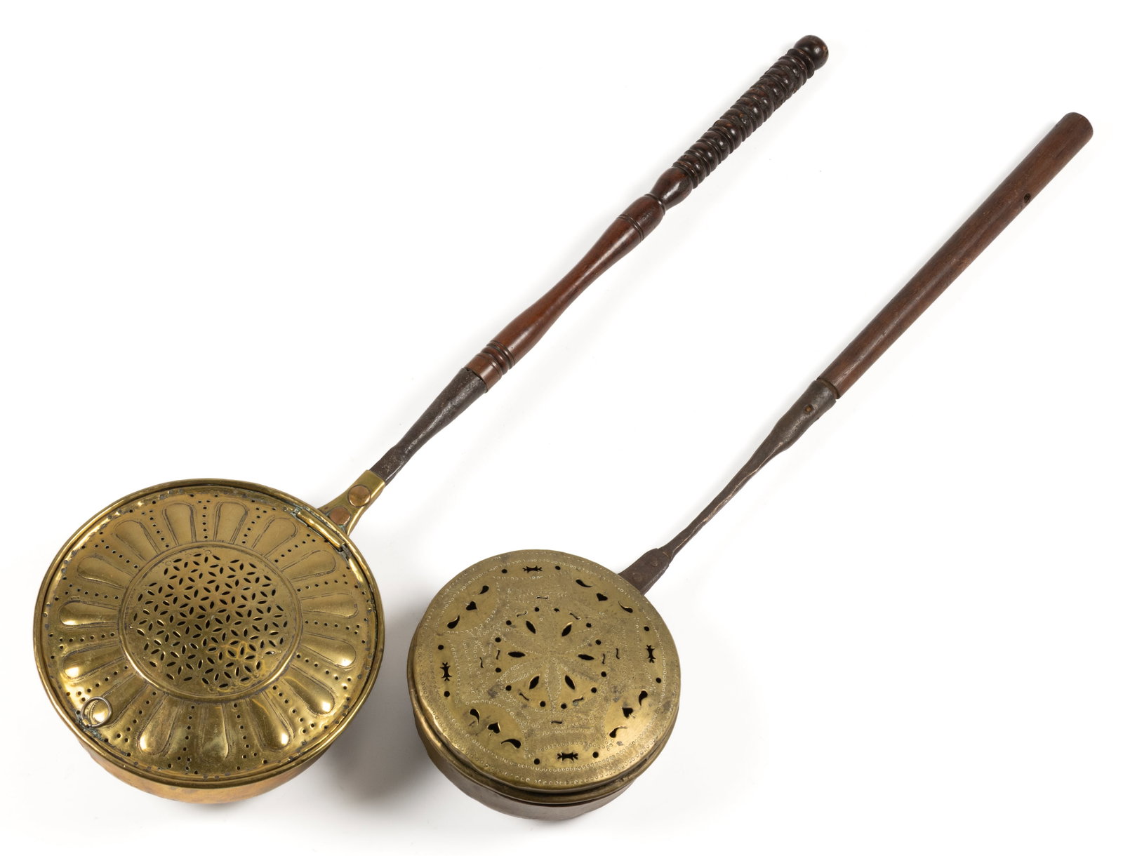 ASSORTED BRASS AND IRON WARMING PANS WITH WOODEN HANDLES, LOT OF TWO: ASSORTED BRASS AND IRON WARMING PANS WITH WOODEN HANDLES, LOT OF TWO, each with pierced and punched ornamentation to the cover, each having a brass pan and wrought-iron shaft with wooden handle; 