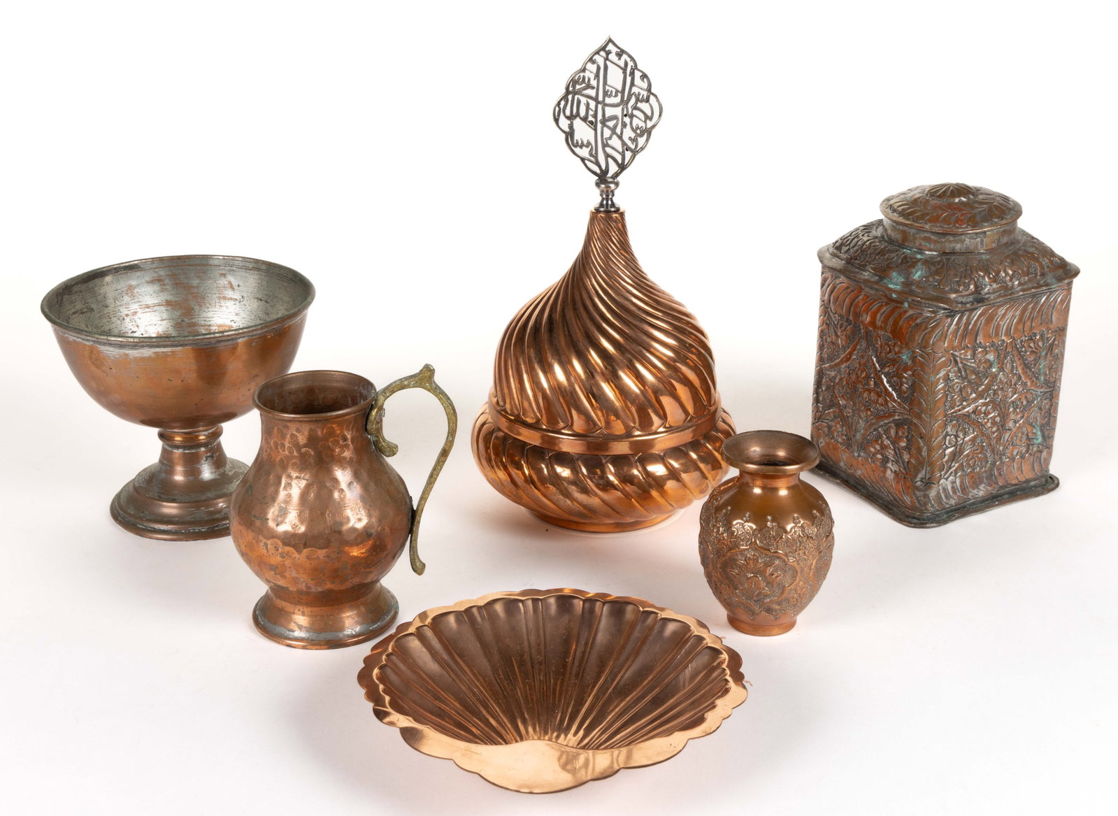 ASSORTED COPPER ARTICLES, LOT OF SIX: ASSORTED COPPER ARTICLES, LOT OF SIX, including a tea caddy-like covered canister, a vase, and a handled mug. 20th century. Tallest 11" HOA. Provenance: From the collection of John B. Craig,