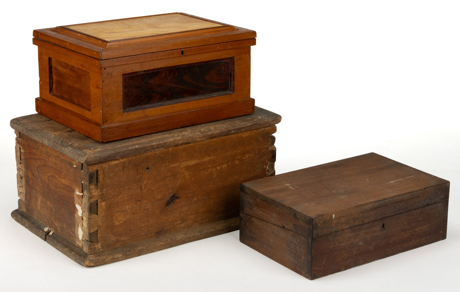 ASSORTED COUNTRY BOXES, LOT OF THREE: ASSORTED COUNTRY BOXES, LOT OF THREE, including a dovetailed example with cover and interior lined with 19th century Pennsylvania newsprint and another example with painted scene to interior. 19th