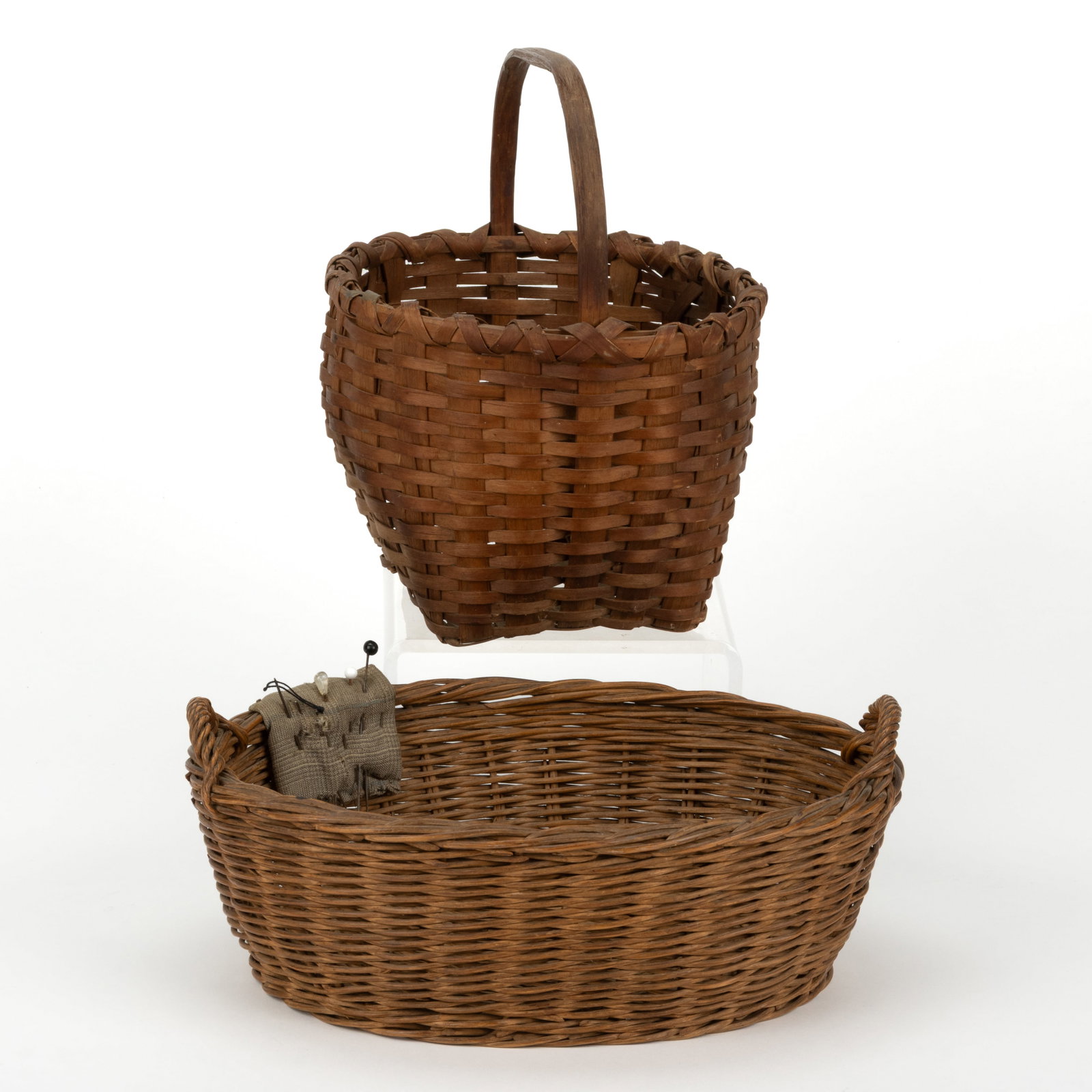 PENNSYLVANIA AND NEW ENGLAND STAVE-TYPE WOVEN-SPLINT AND PULLED-ROD BASKETS, LOT OF TWO (1 of 5)