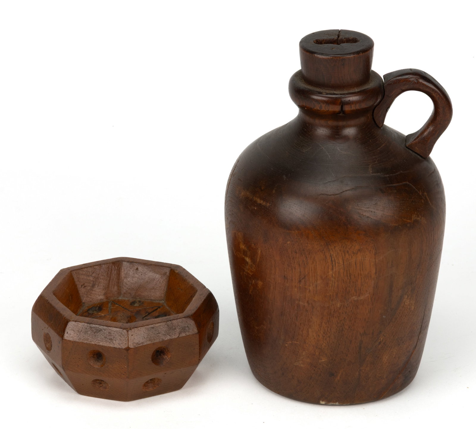 AMERICAN FOLK ART CARVED WOODEN ARTICLES, LOT OF TWO: AMERICAN FOLK ART CARVED WOODEN ARTICLES, LOT OF TWO, comprising a turned walnut jug-form bank with a carved applied handle and a removable poplar base; and a small pin dish with a five-pointed star i
