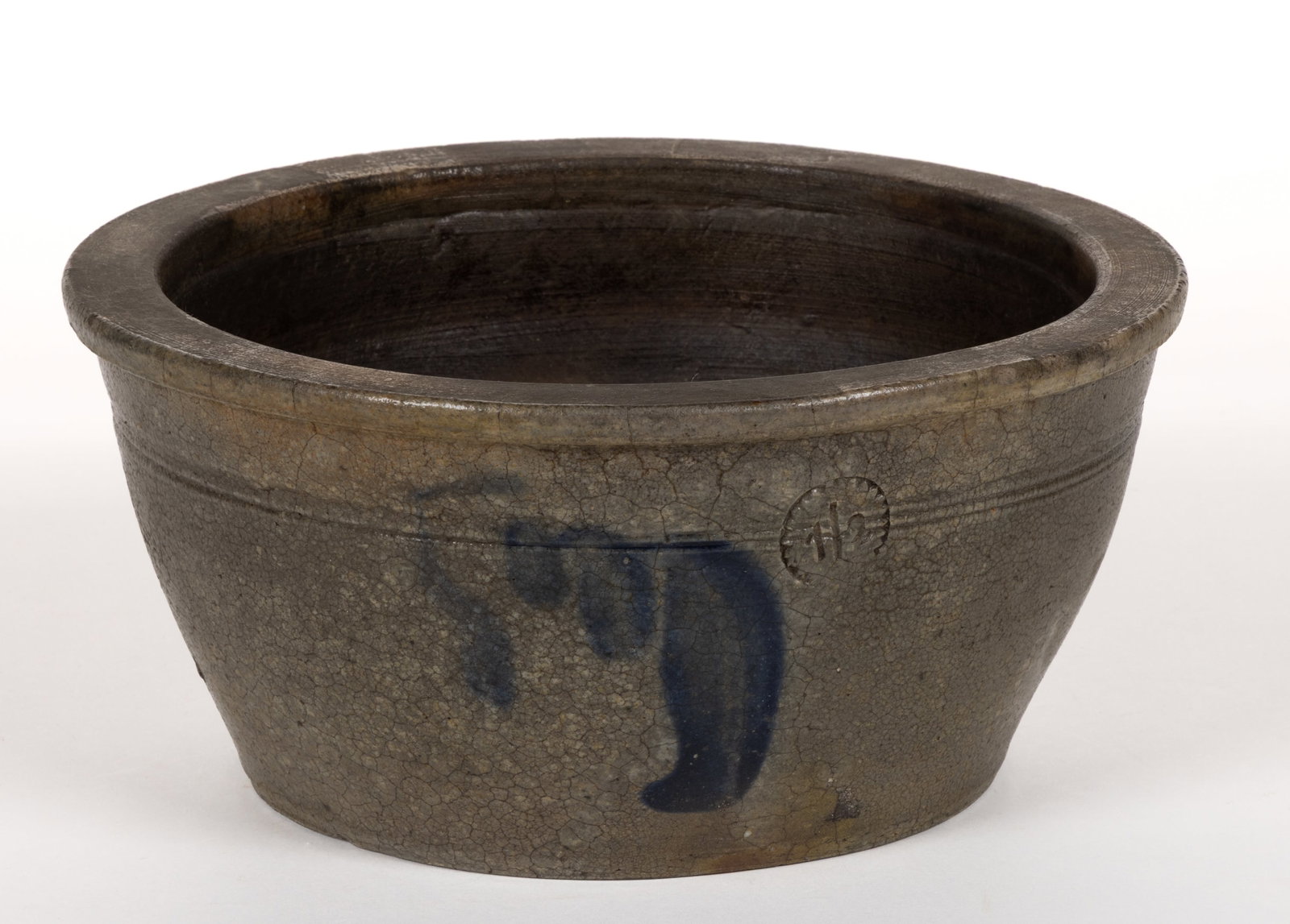 W.H. LEHEW & CO. ATTRIBUTED, STRASBURG, SHENANDOAH VALLEY OF VIRGINIA DECORATED STONEWARE BOWL: W.H. LEHEW & CO. ATTRIBUTED, STRASBURG, SHENANDOAH VALLEY OF VIRGINIA DECORATED STONEWARE BOWL, salt-glazed, "1/2" gallon capacity mark, flat-top rounded rim and incised rings to shoulde
