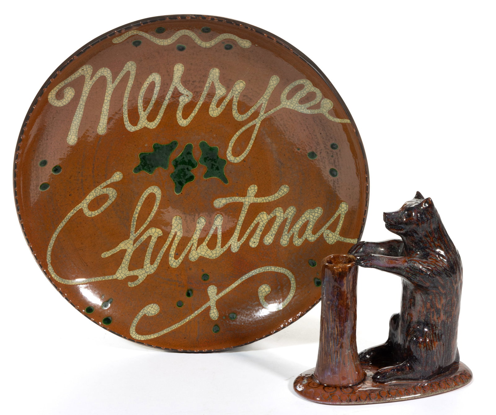 CONTEMPORARY REPRODUCTION EARTHENWARE / REDWARE ARTICLES, LOT OF TWO: CONTEMPORARY REPRODUCTION EARTHENWARE / REDWARE ARTICLES, LOT OF TWO, lead-glazed, comprising a 11 3/4" D dish having yellow-slip trailed "Merry / Christmas" with green holly leaves,