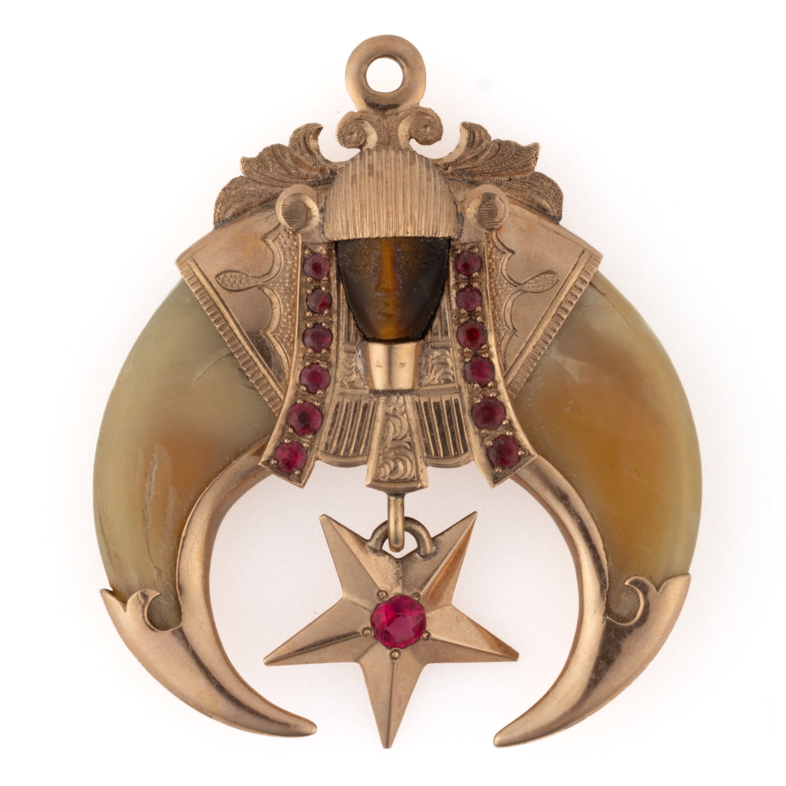 ANTIQUE 10K GOLD, STONE, AND CLAW SHRINERS / MASONIC PENDANT / JEWEL: ANTIQUE 10K GOLD, STONE, AND CLAW SHRINERS / MASONIC PENDANT / JEWEL, gold mounts, featuring two claws with a central pharaoh mask having a carved tigers eye face bordered by 12 pink, probably tourmal