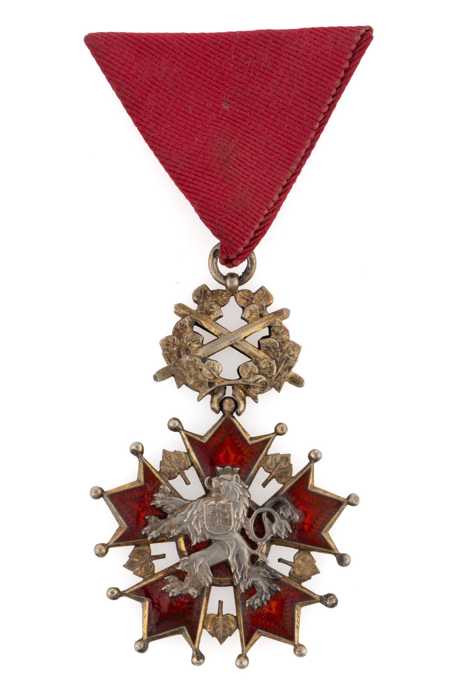 CZECHOSLOVAKIA "ORDER OF THE WHITE LION" BADGE: CZECHOSLOVAKIA "ORDER OF THE WHITE LION" BADGE, enamel and silver/silver-gilt of unknown fineness, the center with an applied heraldic lion the reverse with detailed enamel scenes and letter