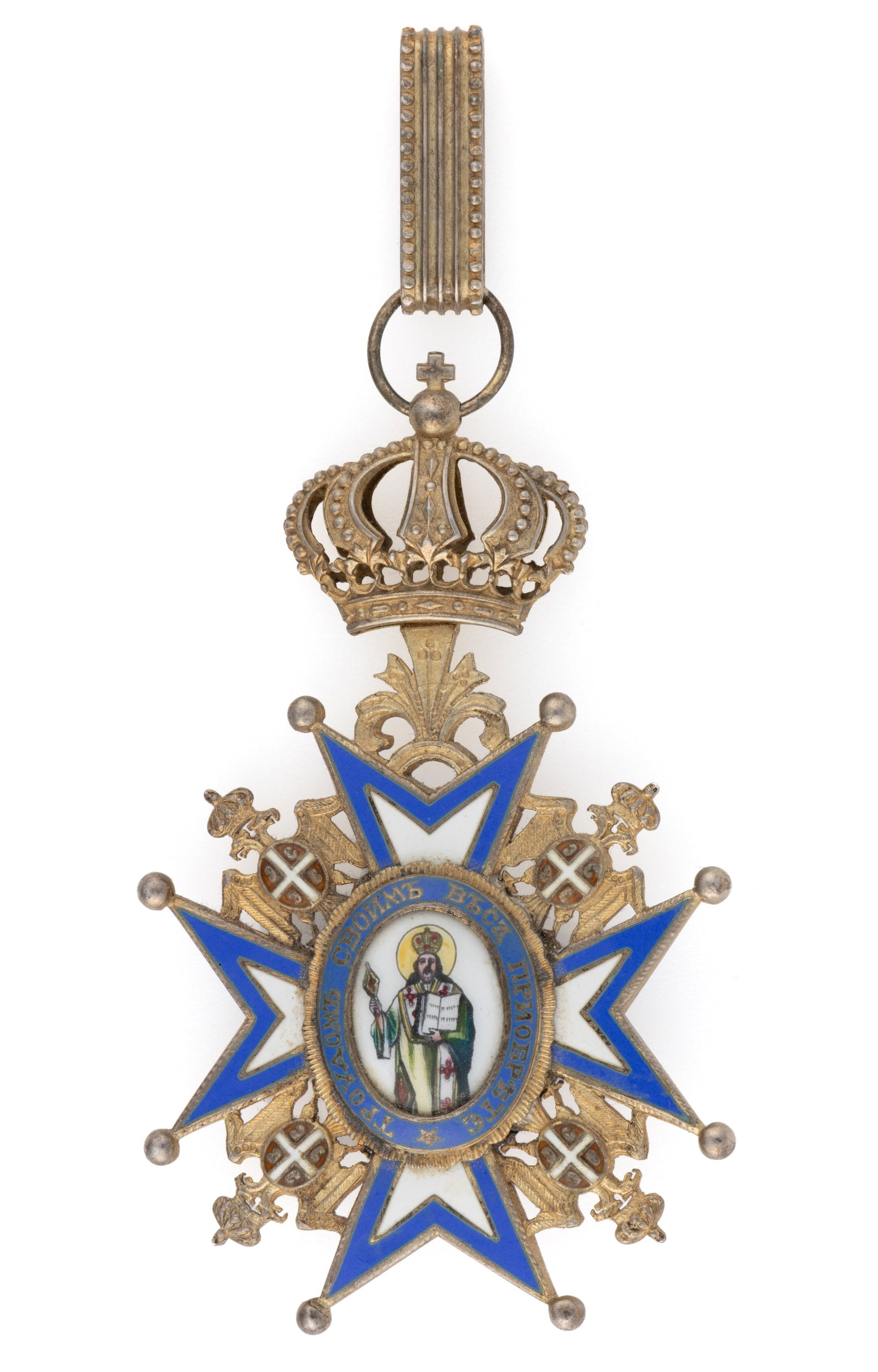 SERBIA "ORDER OF SAINT SAVA" BADGE: SERBIA "ORDER OF SAINT SAVA" BADGE, enamel and silver-gilt of unknown fineness, type II, probably third class, Maltese cross featuring a central medallion of Saint Sava, the revers