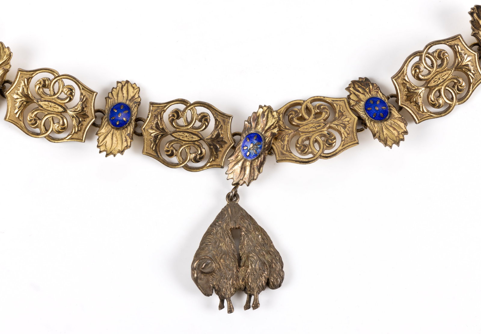 ORDER OF THE GOLDEN FLEECE GILT COLLAR CHAIN: ORDER OF THE GOLDEN FLEECE GILT COLLAR CHAIN, chain of large openwork links alternating with flame-like links having enameled centers, holding a sheep badge / pendant. Unmarked. Late 19th/first half 2