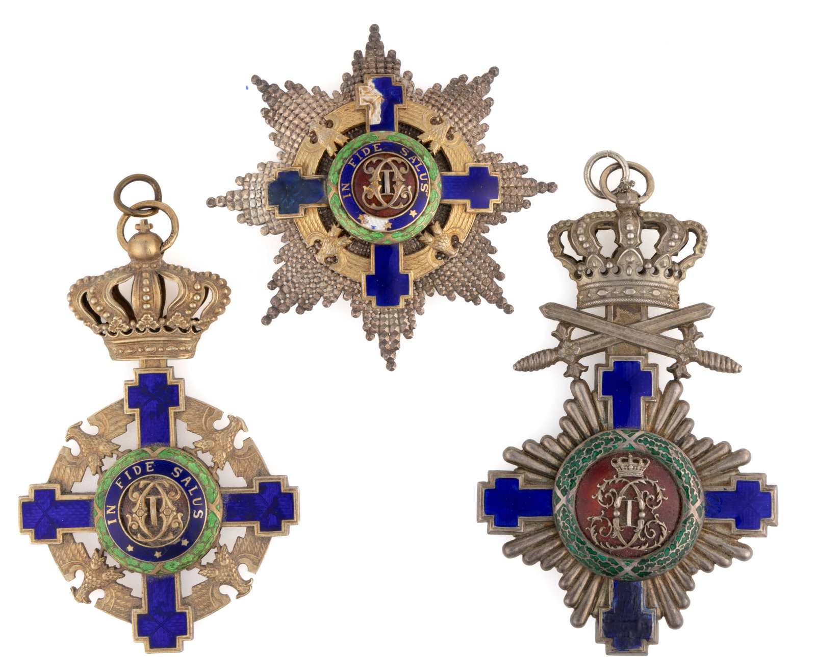 ROMANIA "ORDER OF THE STAR" BREAST STAR AND BADGES / MEDALS, LOT OF THREE: ROMANIA "ORDER OF THE STAR" BREAST STAR AND BADGES / MEDALS, LOT OF THREE, enamel and silver of unknown fineness, each of a similar form with blue crosses surrounding a central field with th