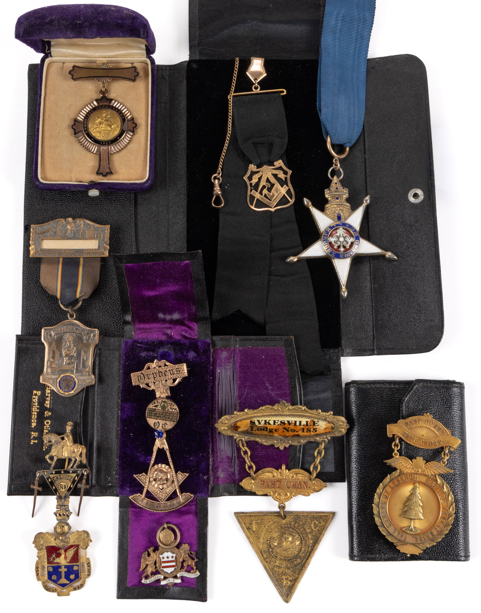 ANTIQUE AND VINTAGE MASONIC / SOCIETY BADGES / JEWELS, LOT OF NINE: ANTIQUE AND VINTAGE MASONIC / SOCIETY BADGES / JEWELS, LOT OF NINE, including a watch chain with black ribbon fob having Masonic emblem; a Knights Templar badge / jewel for the Cambridge Commandery wi
