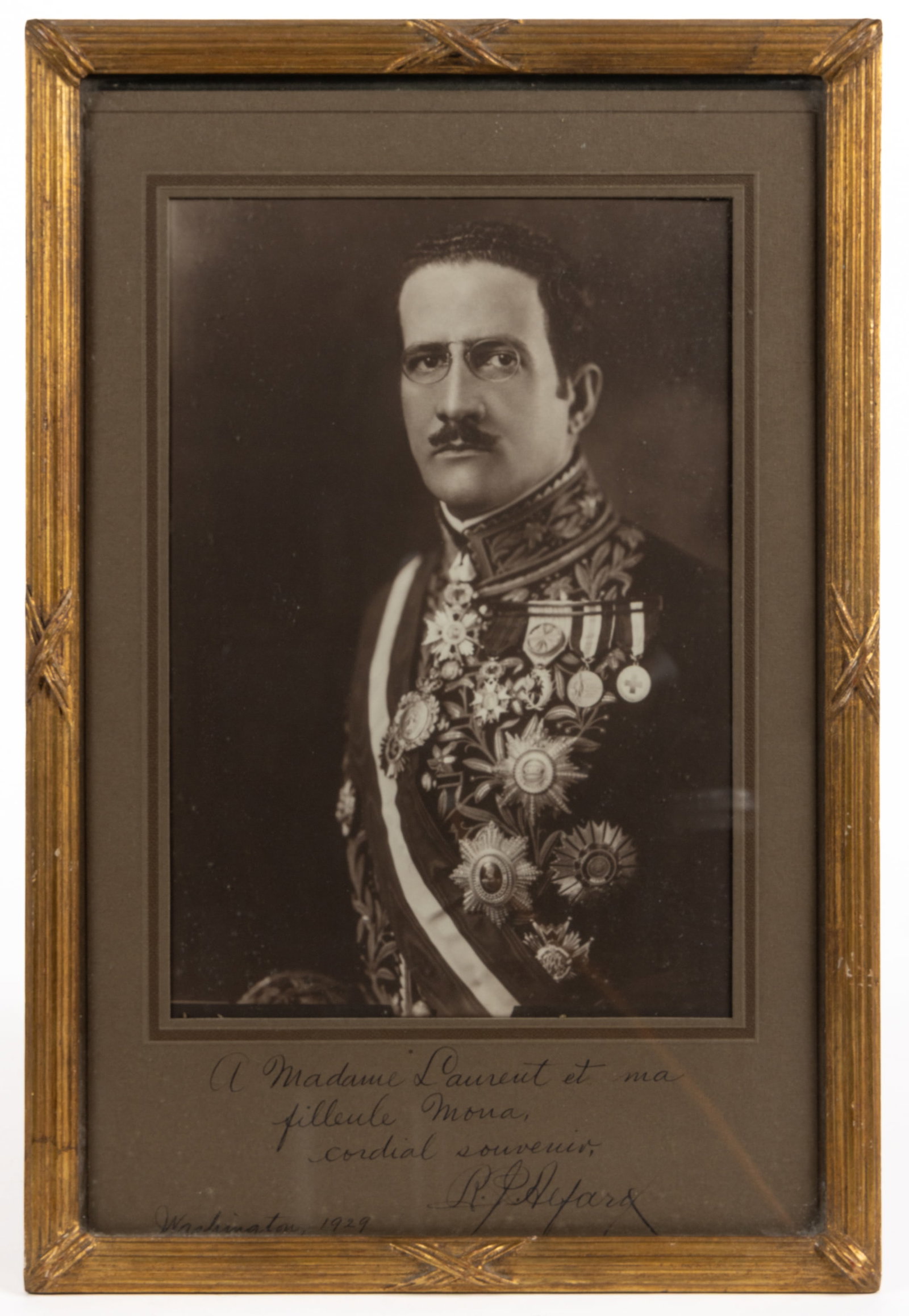 KING ALEXANDER I OF YUGOSLAVIA (1888-1934) PRESENTATION PHOTOGRAPH: KING ALEXANDER I OF YUGOSLAVIA (1888-1934) PRESENTATION PHOTOGRAPH, gelatin silver print with original matte, a waist-length portrait of the King in full military regalia, bearing an inked inscription