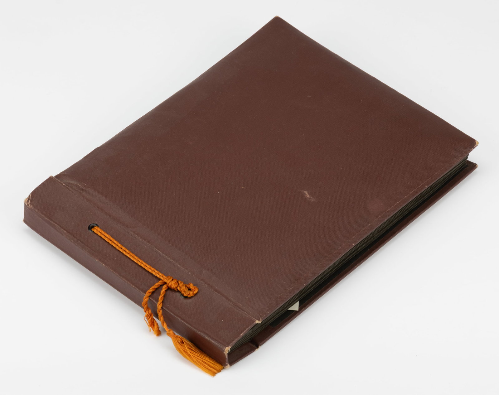 WORLD WAR II / TWO BURMA AND INDIA PHOTO ALBUM: WORLD WAR II / TWO BURMA AND INDIA PHOTO ALBUM, 20 pages, mostly full of 105 +/- snapshot photos and ten finely executed ink sketches of local life and costumes. Photos include military life, airplane