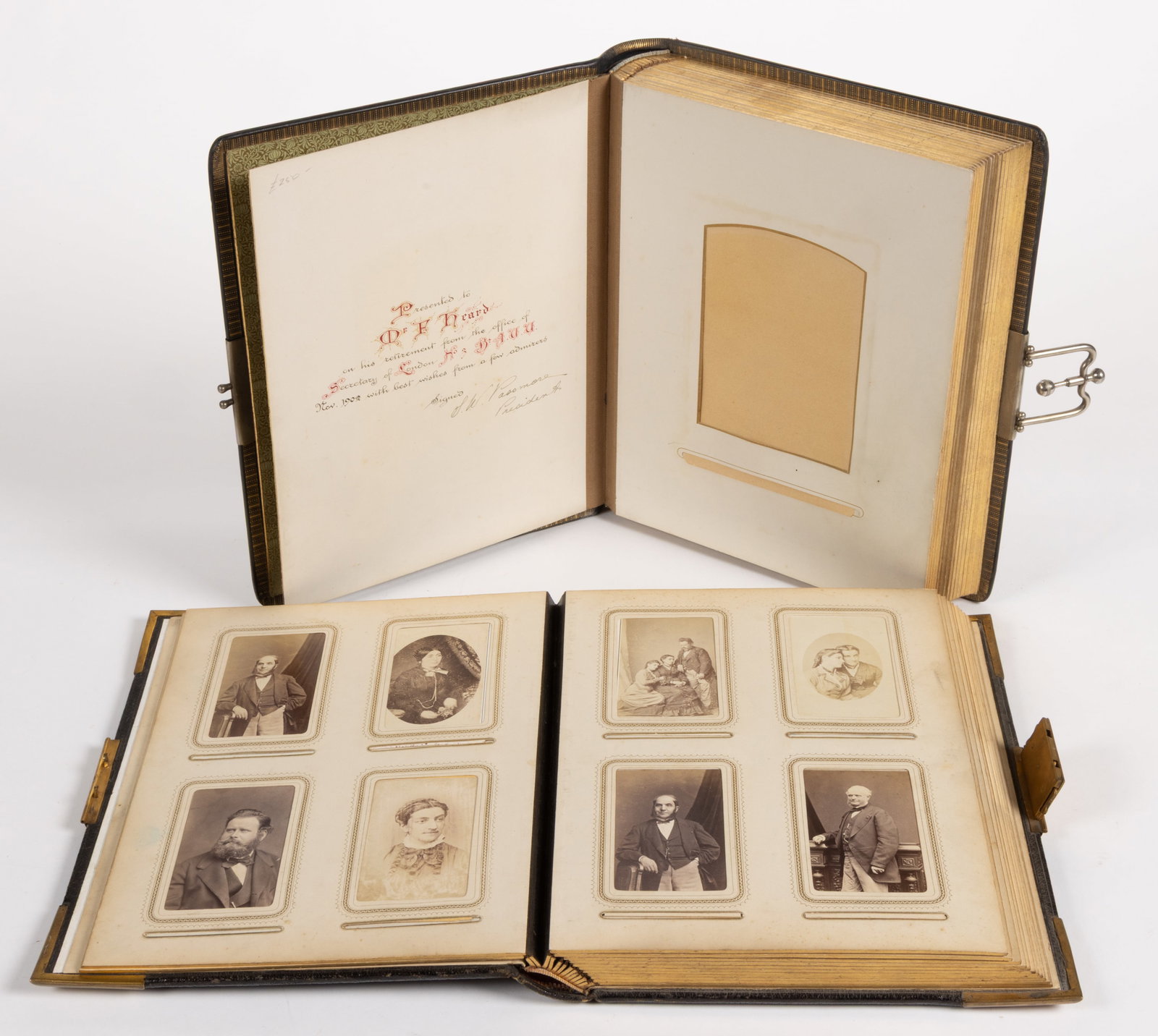 ENGLISH VICTORIAN / EDWARDIAN PHOTOGRAPH ALBUMS, LOT OF TWO: ENGLISH VICTORIAN / EDWARDIAN PHOTOGRAPH ALBUMS, LOT OF TWO, comprising (1) a gilt-stamped black leather example having a calligraphic presentation on the front flyleaf to "Mr. P. Heard on his re