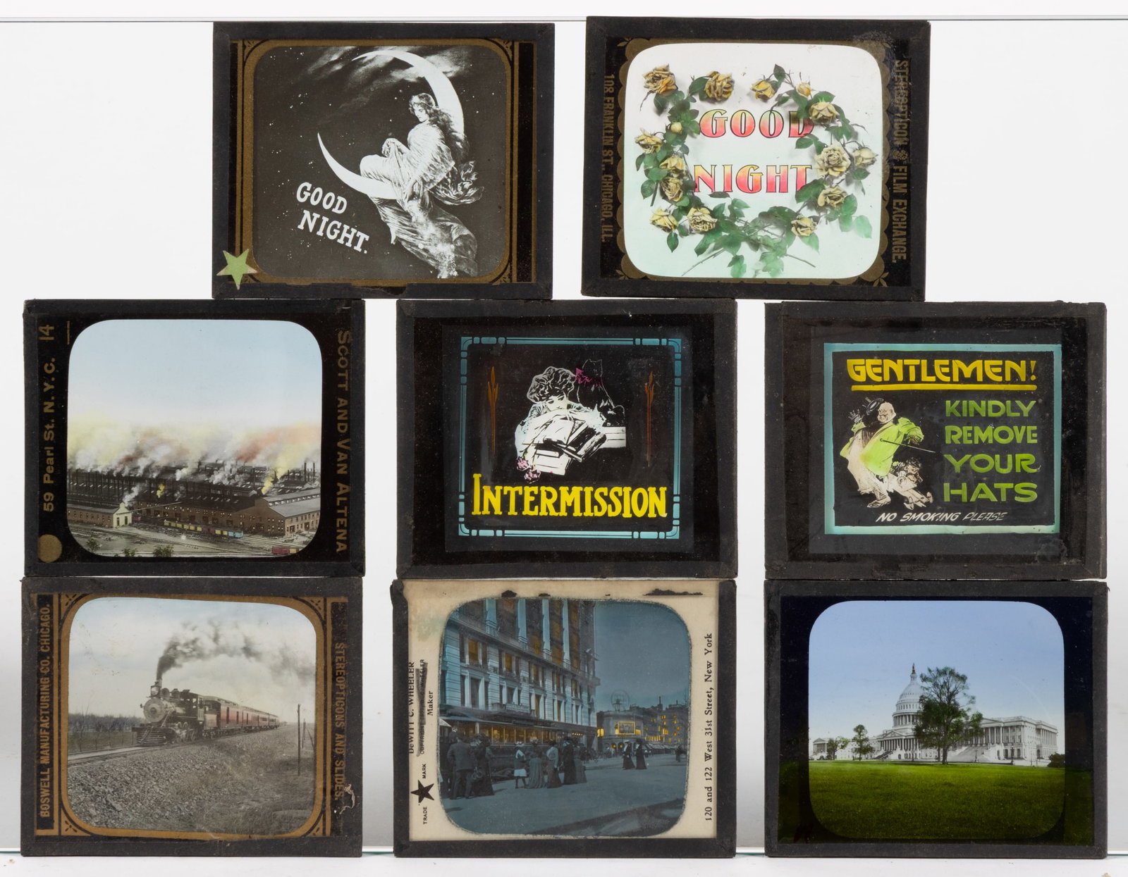ADVERTISING AND OTHER TOPICAL GLASS LANTERN SLIDES, LOT OF 16: ADVERTISING AND OTHER TOPICAL GLASS LANTERN SLIDES, LOT OF 16, all but one hand-colored, including three Sanitas wallpaper advertisements with lettering for E. S. Butler, 495 Water St., Harrisonburg, 
