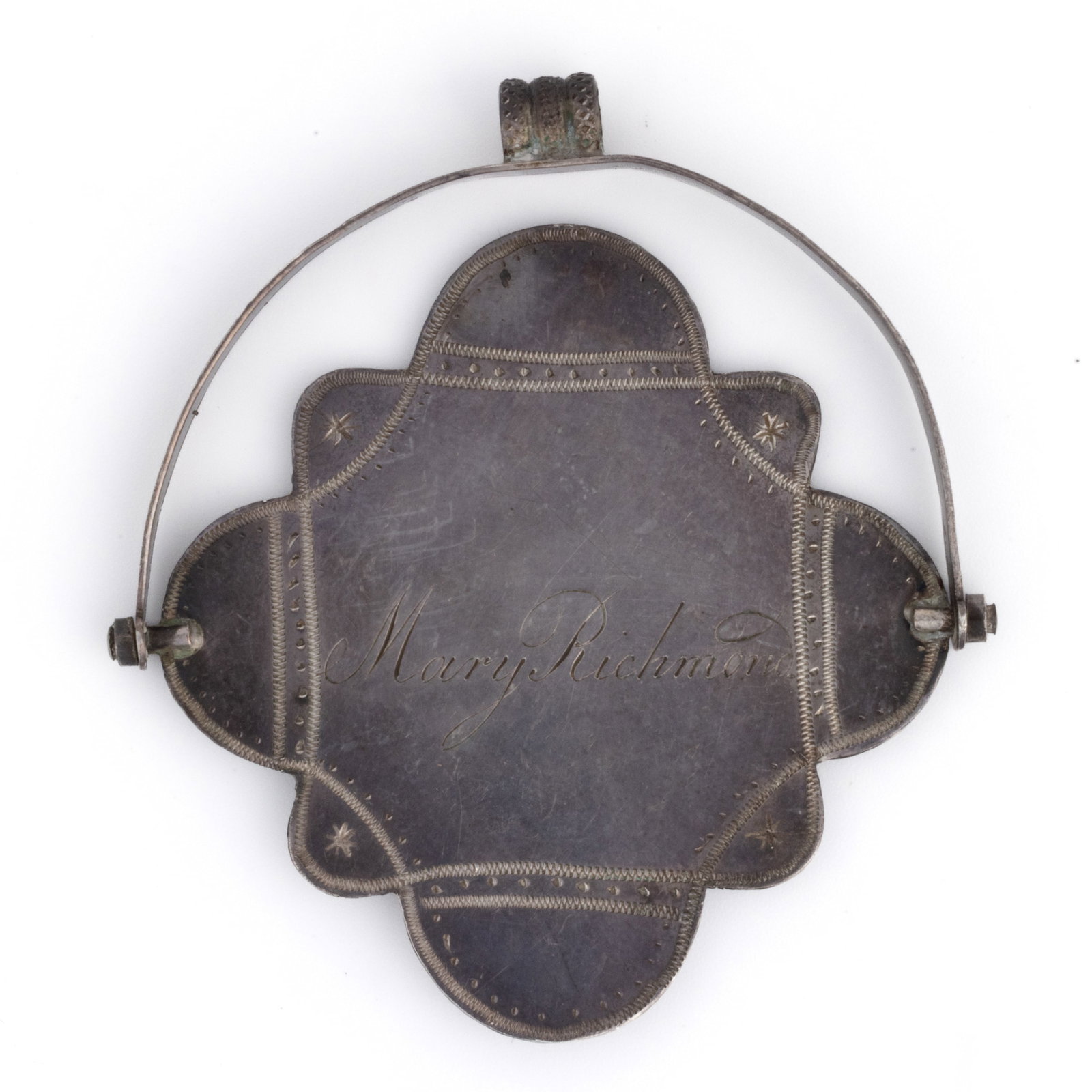 AMERICAN SILVER REWARD OF MERIT: AMERICAN SILVER REWARD OF MERIT, lobed-form medallion with bright-cut engraved border, one side with "Reward of Merit", and the other with "Mary Richmond." name, swivels on an arch