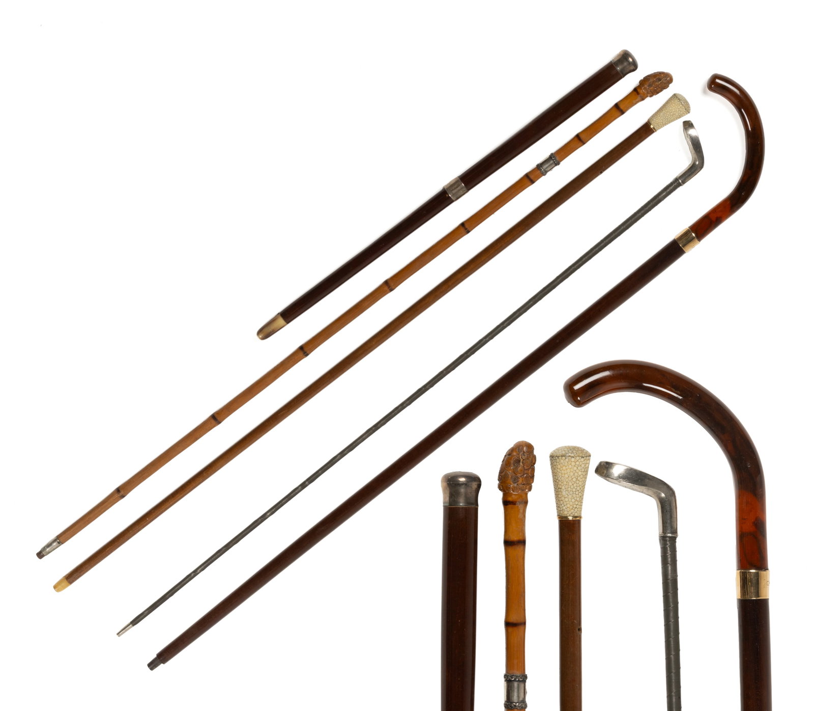 ASSORTED CANES / WALKING STICKS AND RELATED ARTICLES, LOT OF FIVE: ASSORTED CANES / WALKING STICKS AND RELATED ARTICLES, LOT OF FIVE, including a bamboo example with a marked "STERLING" band; an example with a faux-amber handle engraved "CHARLIE" 
