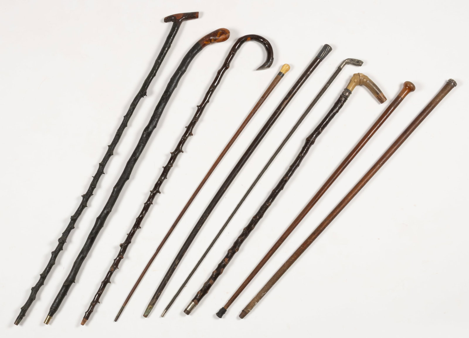 ASSORTED STERLING-TIPPED AND OTHER DRESS CANES / WALKING STICKS, LOT OF NINE (1 of 2)