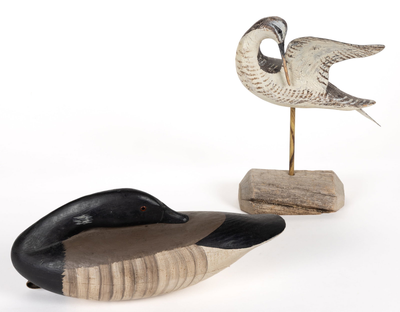AMERICAN FOLK ART CARVED AND PAINTED SHOREBIRD AND GOOSE DECOYS, LOT OF TWO: AMERICAN FOLK ART CARVED AND PAINTED SHOREBIRD AND GOOSE DECOYS, LOT OF TWO, each hand-carved and polychrome-painted, comprising a preening Yellowlegs signed "W. R. Freden 95", and a pr