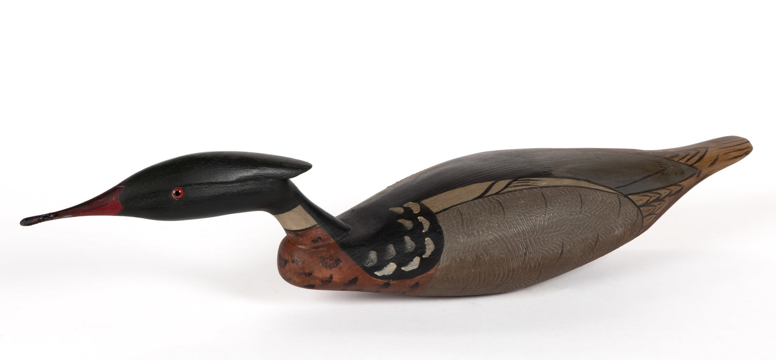 MAURICE PEASE (DUCK, NORTH CAROLINA) CARVED AND PAINTED RED-BREASTED MERGANSER DECOY: MAURICE PEASE (DUCK, NORTH CAROLINA) CARVED AND PAINTED RED-BREASTED MERGANSER DECOY, polychrome-painted with glass eyes, signed "MAURICE / DUCK, N.C." to underside of base. Circa 