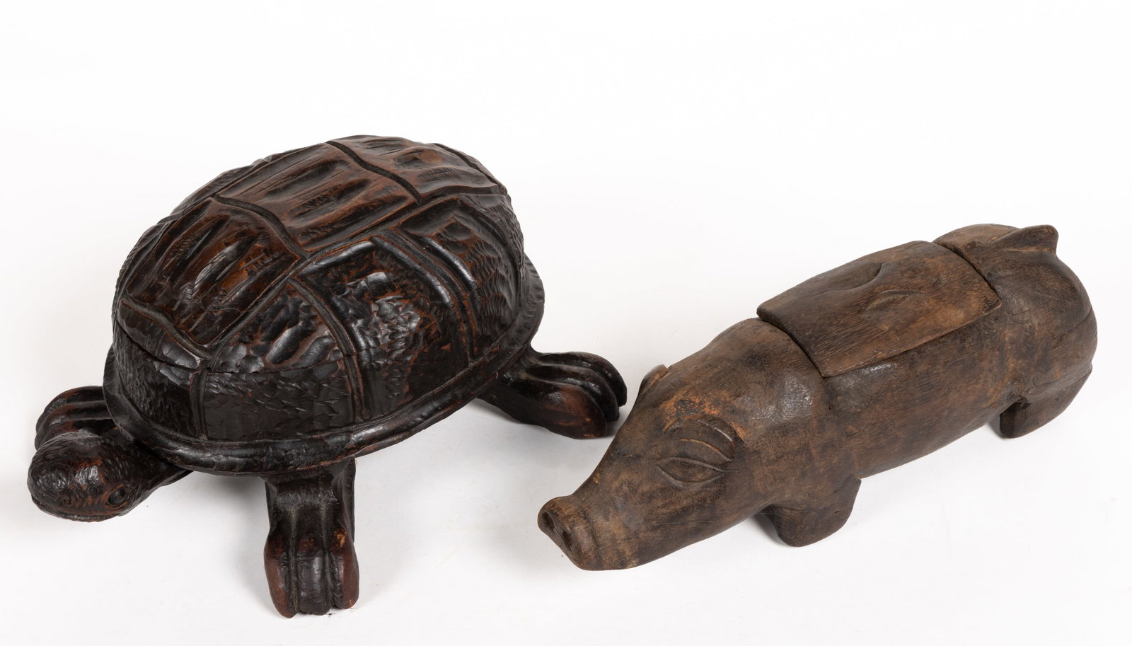 ASSORTED FOLK ART CARVED WOODEN FIGURAL ANIMAL CONTAINERS, LOT OF TWO: ASSORTED FOLK ART CARVED WOODEN FIGURAL ANIMAL CONTAINERS, LOT OF TWO, comprising of a turtle with a dark finish, having a spring-activated head which opens the shell serving as a hinged lid, metal sp