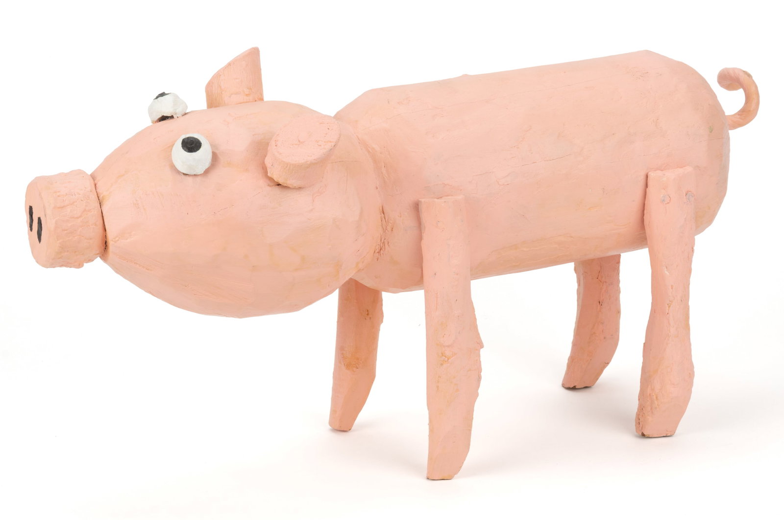 AMERICAN FOLK ART CARVED AND PAINTED FIGURE OF A PIG: AMERICAN FOLK ART CARVED AND PAINTED FIGURE OF A PIG, carved of the solid, with four applied legs and walnut-shell eyes. Retains the original painted surface. 21st century. 10 3/4" HOA.