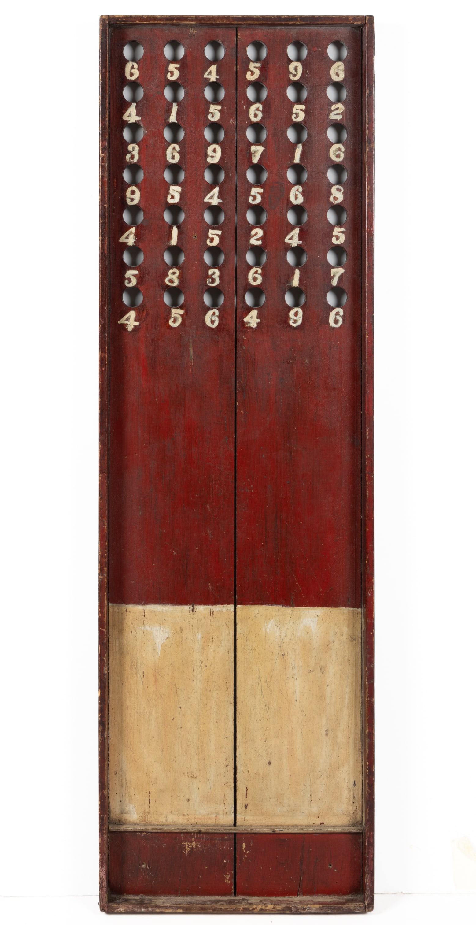 AMERICAN FOLK ART PAINTED WOODEN CARNIVAL / CIRCUS BALL-TOSS GAME BOARD: AMERICAN FOLK ART PAINTED WOODEN CARNIVAL / CIRCUS BALL-TOSS GAME BOARD, rectangular form with applied wooden fence molding, retaining likely original red-and-white surface. First quarter 20th century