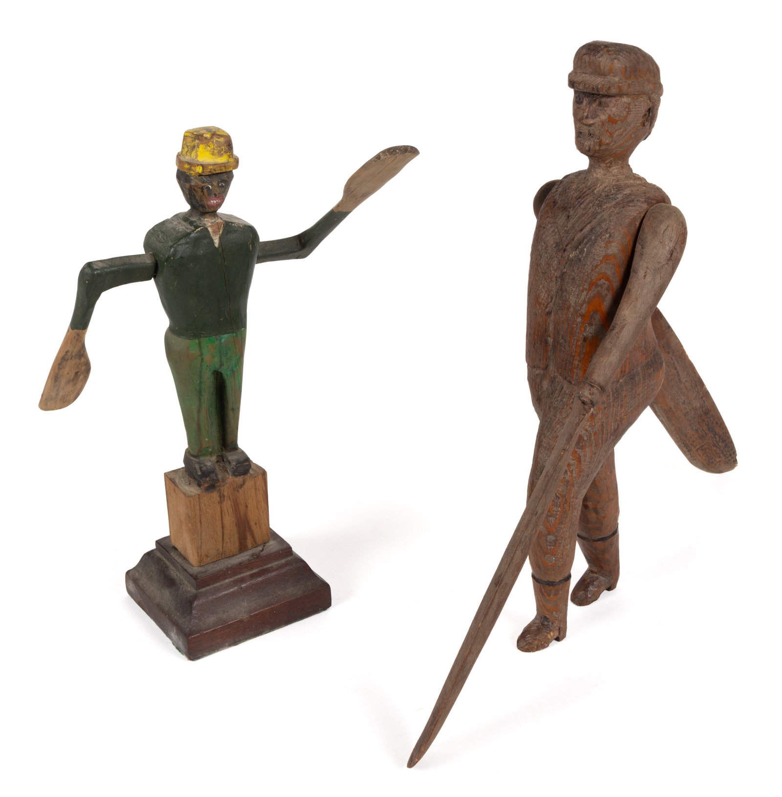 FOLK ART CARVED AND PAINTED WHIRLIGIGS, LOT OF TWO: FOLK ART CARVED AND PAINTED WHIRLIGIGS, LOT OF TWO, comprising one depicting a man with a suit jacket, pants, boots, and a hat with long fins, not painted, and a man with green pants, a blue