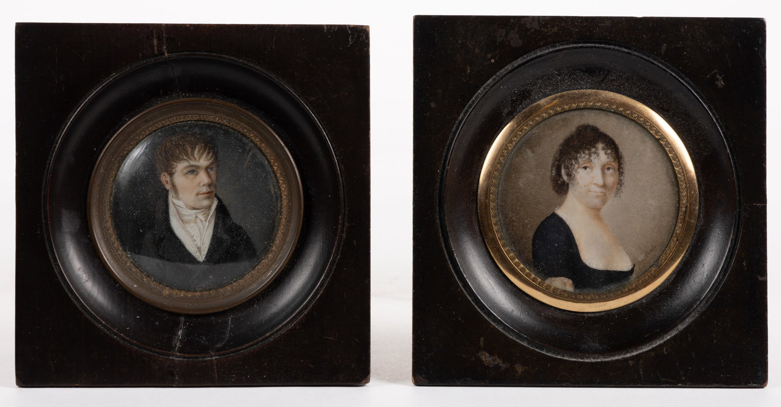 CONTINENTAL SCHOOL (19TH CENTURY) MINIATURE PORTRAITS, LOT OF TWO: CONTINENTAL SCHOOL (19TH CENTURY) MINIATURE PORTRAITS, LOT OF TWO, watercolor, comprising a bust-length depiction of a lady with brown curly hair and a low black dress with lace edges; and a bust-leng