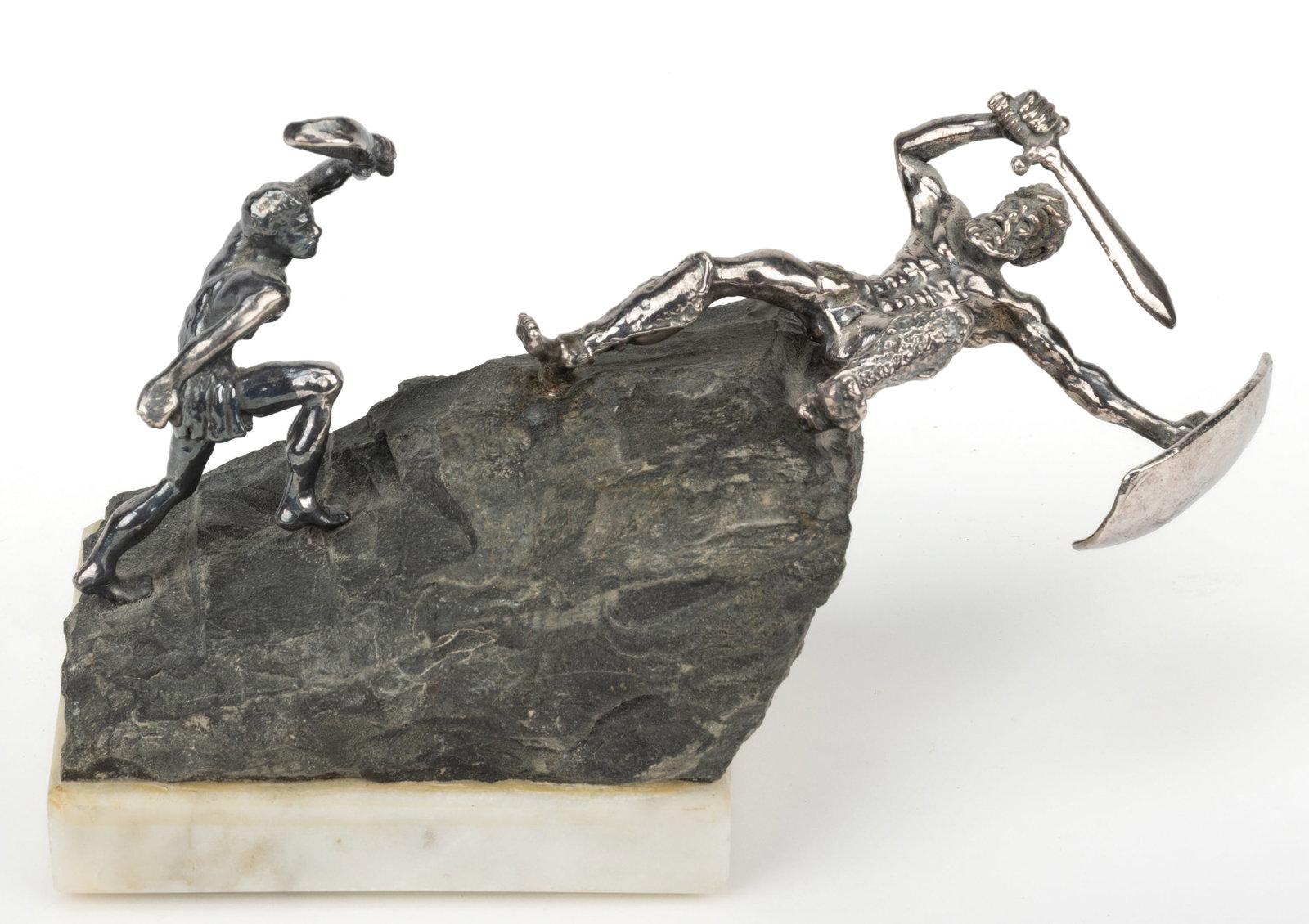 YAACOV HELLER (ISRAELI / AMERICAN, B. 1941) DAVID AND GOLIATH STATUE: YAACOV HELLER (ISRAELI / AMERICAN, B. 1941) DAVID AND GOLIATH STATUE, hollow-cast sterling silver (unmarked) or possibly silver-plated, depicting the figures of David and Goliath on a naturalistic