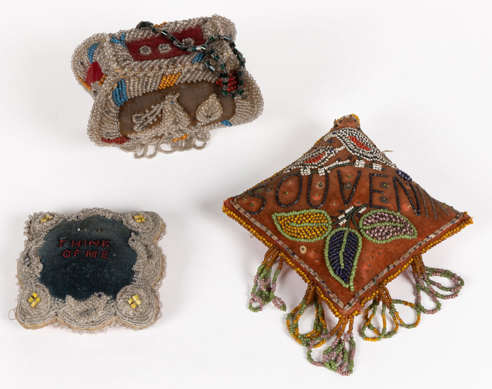 ASSORTED NATIVE AMERICAN HAUDENOSAUNEE (IROQUOIS) BEADWORK ARTICLES, LOT OF THREE: ASSORTED NATIVE AMERICAN HAUDENOSAUNEE (IROQUOIS) BEADWORK ARTICLES, LOT OF THREE, comprising two pincushion examples, including one with beaded "THINK / OF ME",