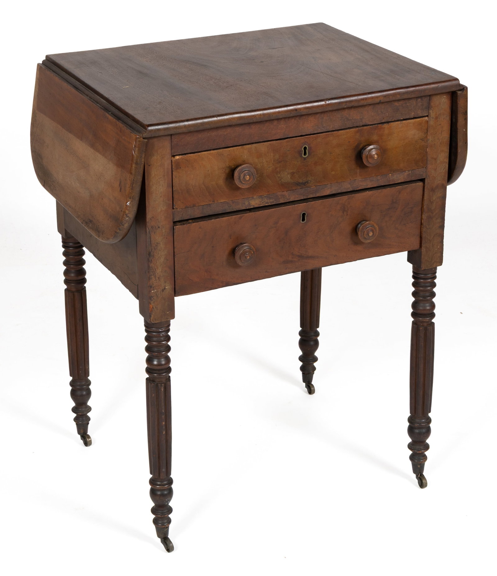 MID-ATLANTIC LATE FEDERAL MAHOGANY WORK TABLE: MID-ATLANTIC LATE FEDERAL MAHOGANY WORK TABLE, featuring two small hinged fall leaves, two full drawers, and turned legs fitted with brass casters. Pine and poplar secondary wood. Retaining an old sur