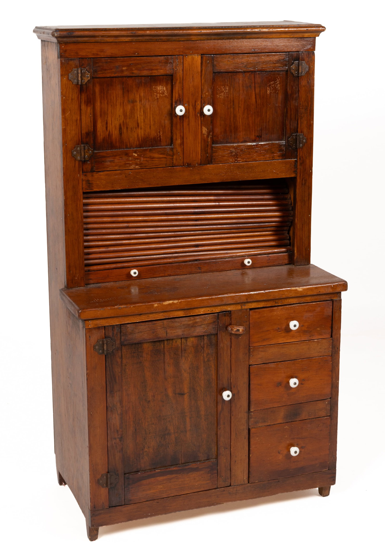 AMERICAN PINE CHILD'S KITCHEN / HOOSIER CUPBOARD: AMERICAN PINE CHILD'S KITCHEN / HOOSIER CUPBOARD, single-piece form, the rectangular top with an applied edge molding over two fielded-panel doors concealing an open interior and an open area