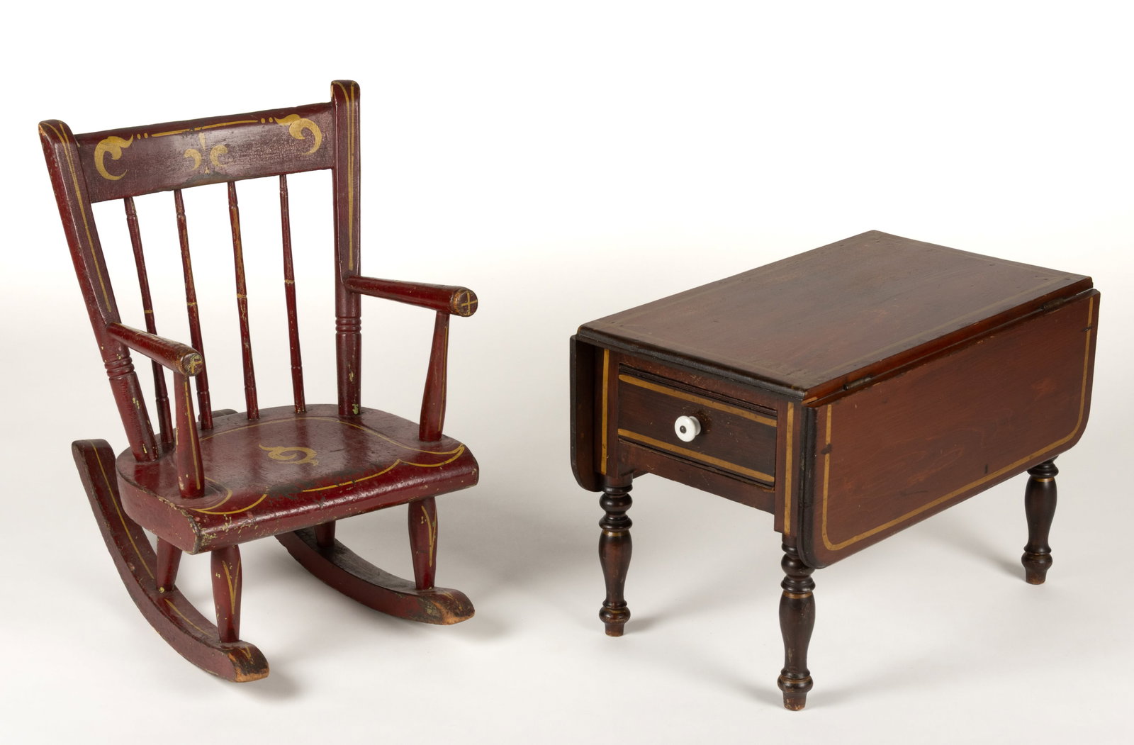 AMERICAN PAINT-DECORATED CHILD'S FURNITURE PIECES, LOT OF TWO: AMERICAN PAINT-DECORATED CHILD'S FURNITURE PIECES, LOT OF TWO, comprising a child's rocker of mixed woods including poplar, white oak or hickory, and possibly maple with bamboo-turned
