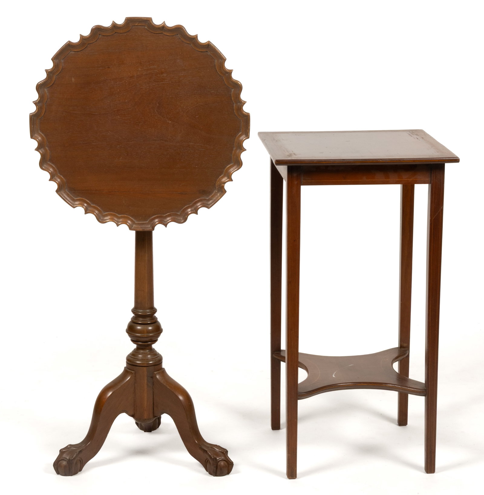 AMERICAN FEDERAL-STYLE MAHOGANY STANDS, LOT OF TWO: AMERICAN FEDERAL-STYLE MAHOGANY STANDS, LOT OF TWO, comprising a tilt-top candlestand with a carved dish top and ball and claw feet; and a square inlaid plant stand with a shaped medial shelf. Both