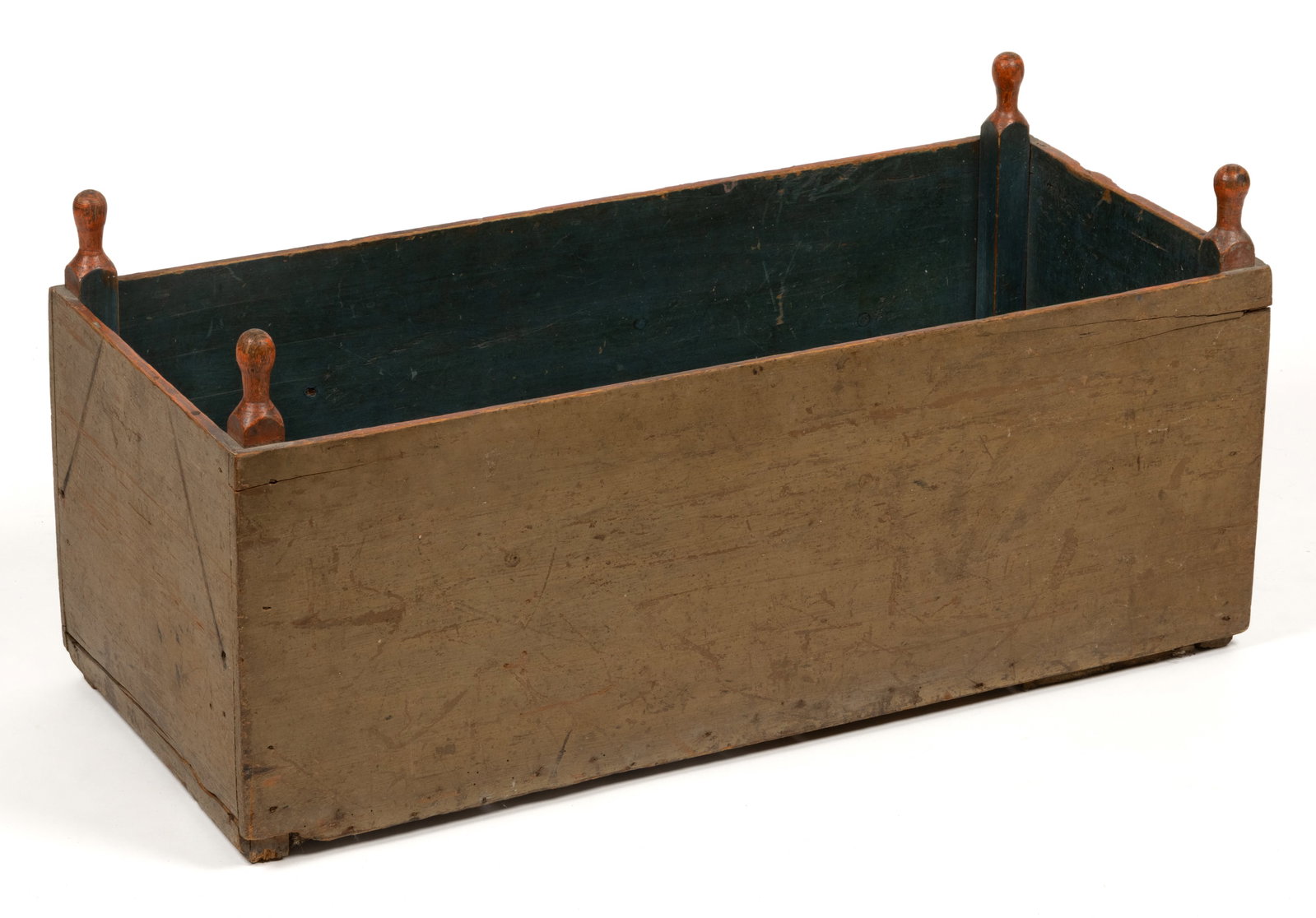 COUNTRY PAINTED WOODEN HANGING CRADLE: COUNTRY PAINTED WOODEN HANGING CRADLE, nailed construction with corner posts terminating in turned finials, hanging holes and witness marks to each end, the whole retaining likely original polychrome