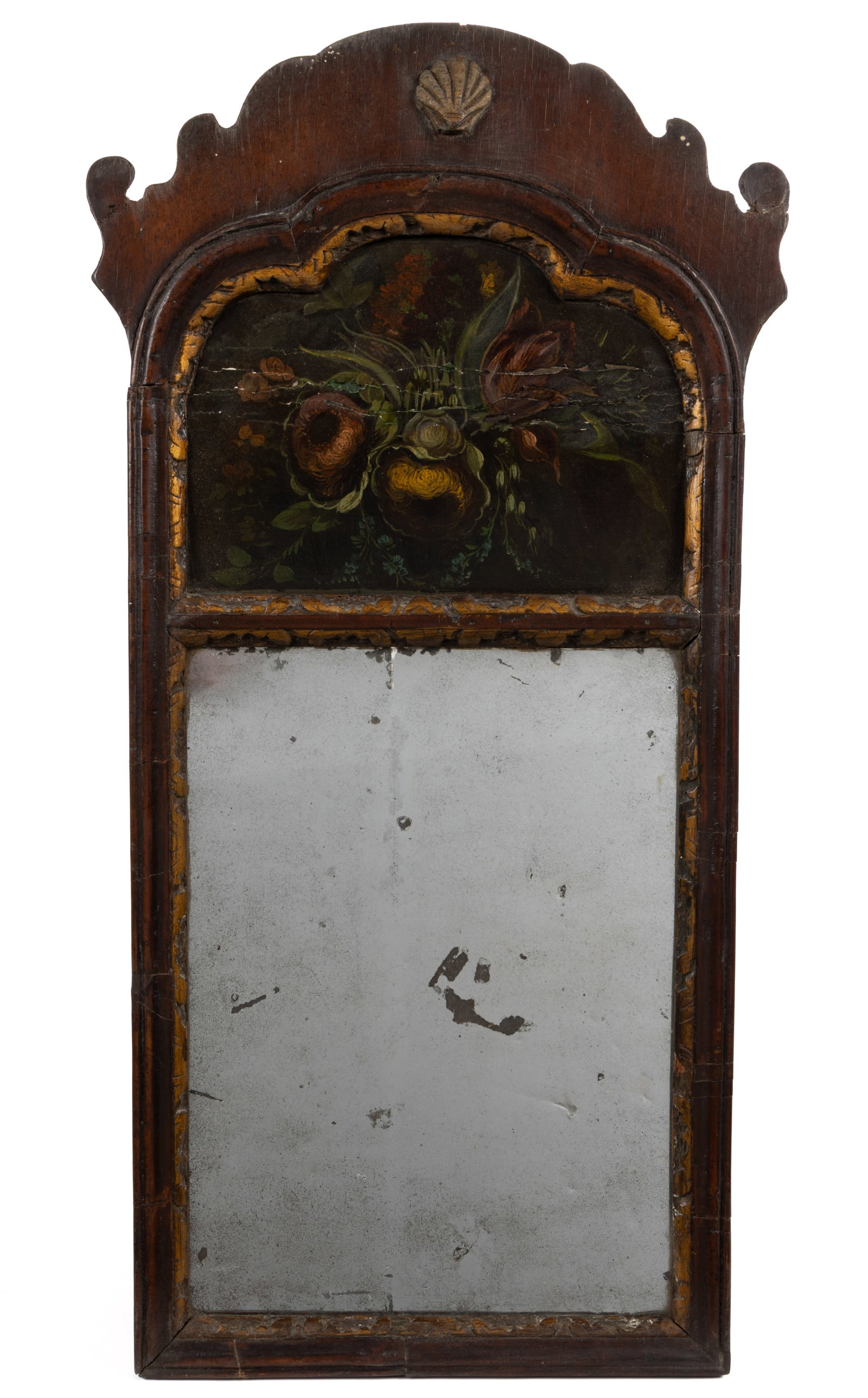 BRITISH PAINT-DECORATED MAHOGANY LOOKING GLASS / WALL MIRROR: BRITISH PAINT-DECORATED MAHOGANY LOOKING GLASS / WALL MIRROR, of rectangular form with a shaped crest, featuring an applied shell carving over a shaped reserve with a floral painting and a rectangular