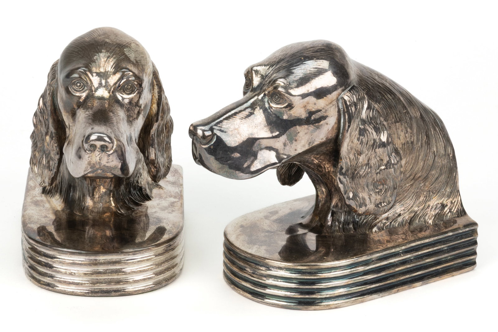 JENNINGS BROTHERS / ABERCROMBIE & FITCH RETAILED NICKEL-PLATED IRISH SETTER / POINTER DOG BOOKENDS,: JENNINGS BROTHERS / ABERCROMBIE & FITCH RETAILED NICKEL-PLATED IRISH SETTER / POINTER DOG BOOKENDS, PAIR, in the Art Deco style, hollow finely-cast form, each with a nickel- or silver-plated surfa