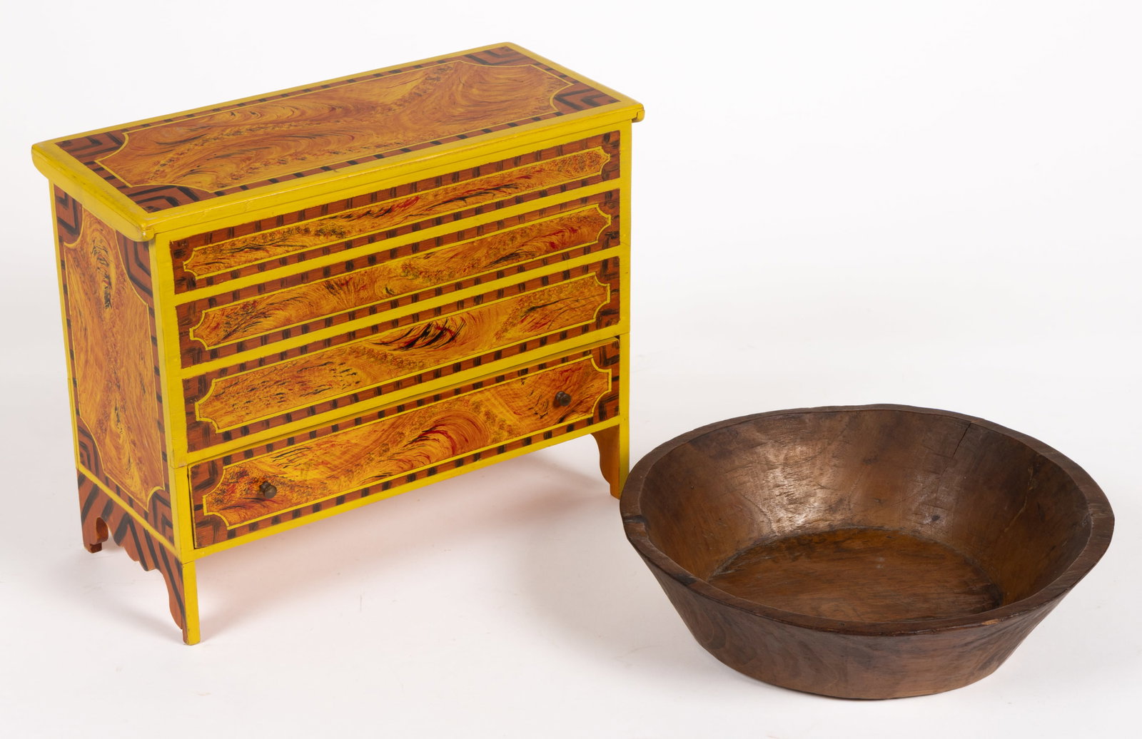 ASSORTED DECORATED OR CARVED WOODEN DOMESTIC ARTICLES, LOT OF TWO: ASSORTED DECORATED OR CARVED WOODEN DOMESTIC ARTICLES, LOT OF TWO, comprising of a McGuire Family paint decorated mule chest, having a faux Shaftbury-style pattern in a bright lemon yel