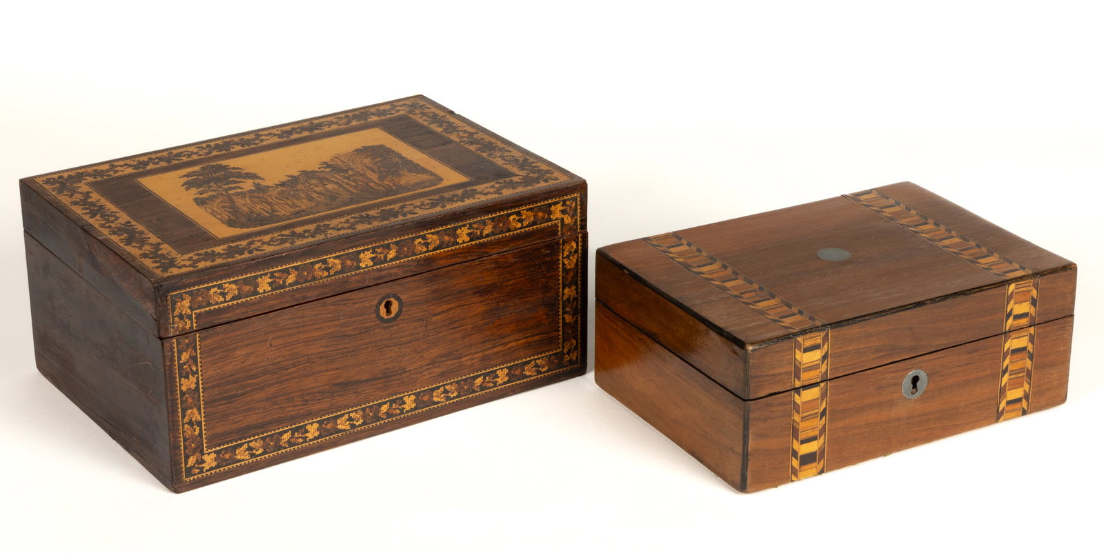 ASSORTED BRITISH WOODEN TUMBRIDGEWARE DRESSER / SEWING WORK BOXES, LOT OF TWO: ASSORTED BRITISH WOODEN TUMBRIDGEWARE DRESSER / SEWING WORK BOXES, LOT OF TWO, each of rectangular form with a hinged lid, comprising of an example with the lid and front having a double-band mos